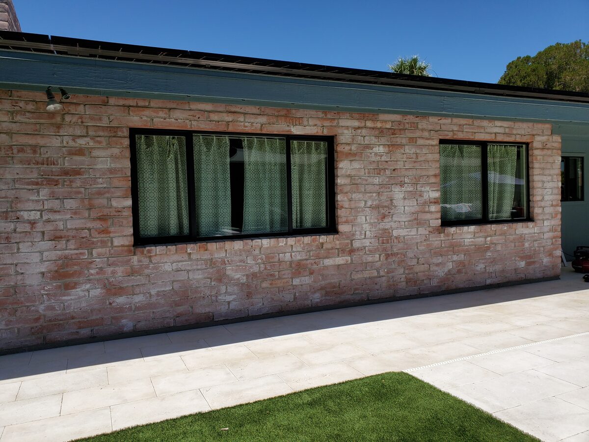 Black vinyl window installed in a Phoenix-area home